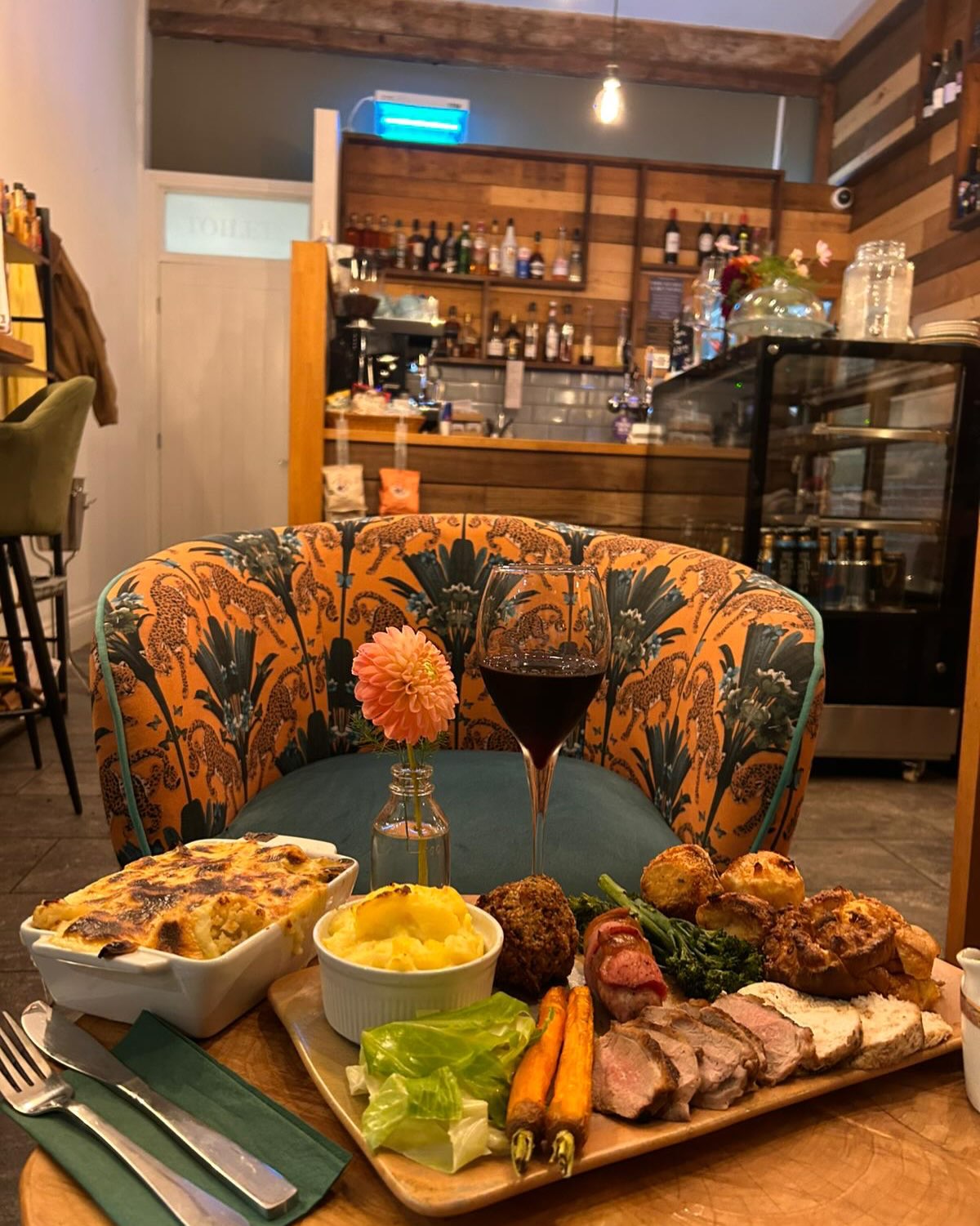 Sunday roast platters served in the bar at The Dovecote